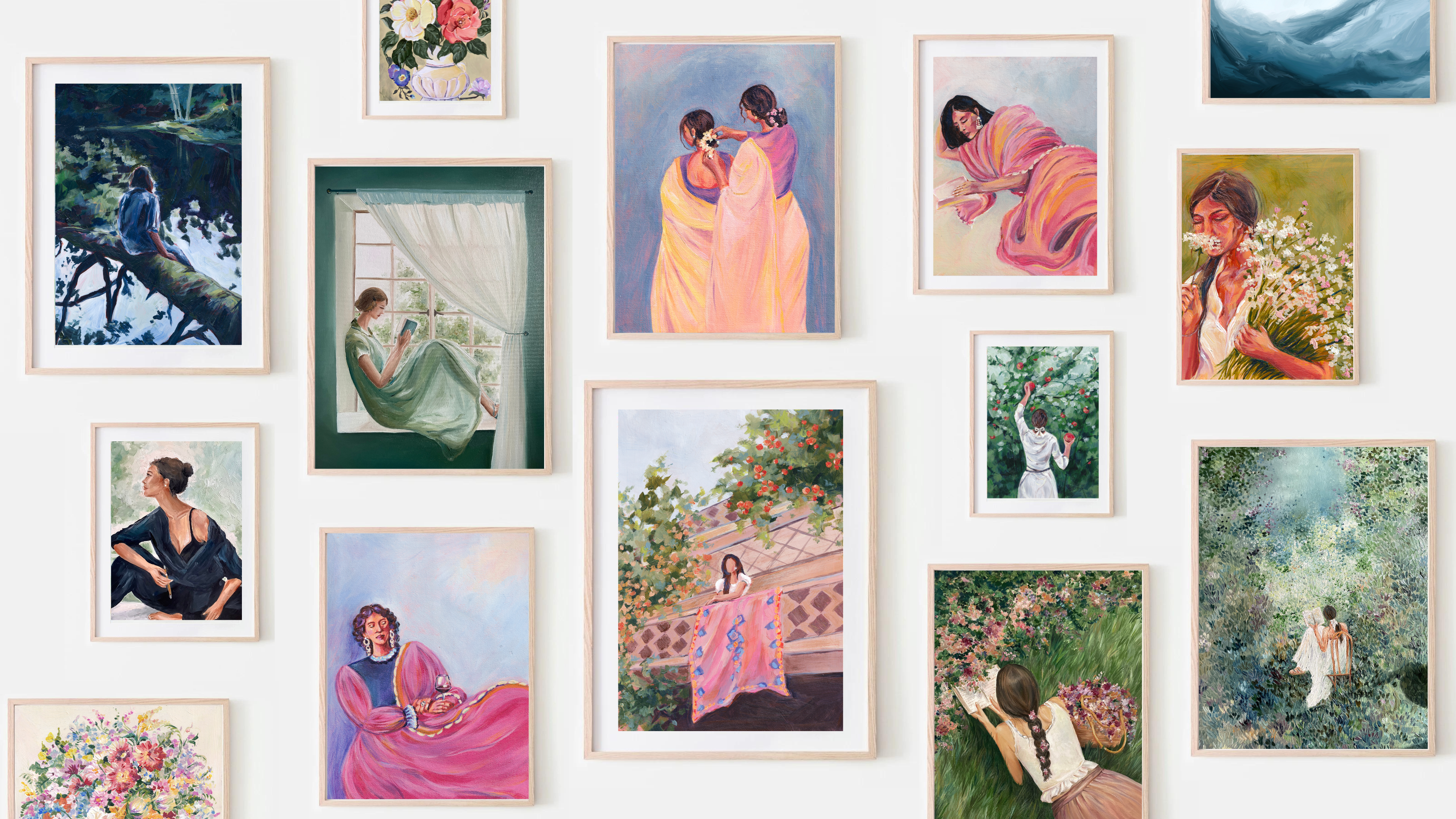 Wall with various framed paintings and photographs of people in different settings.