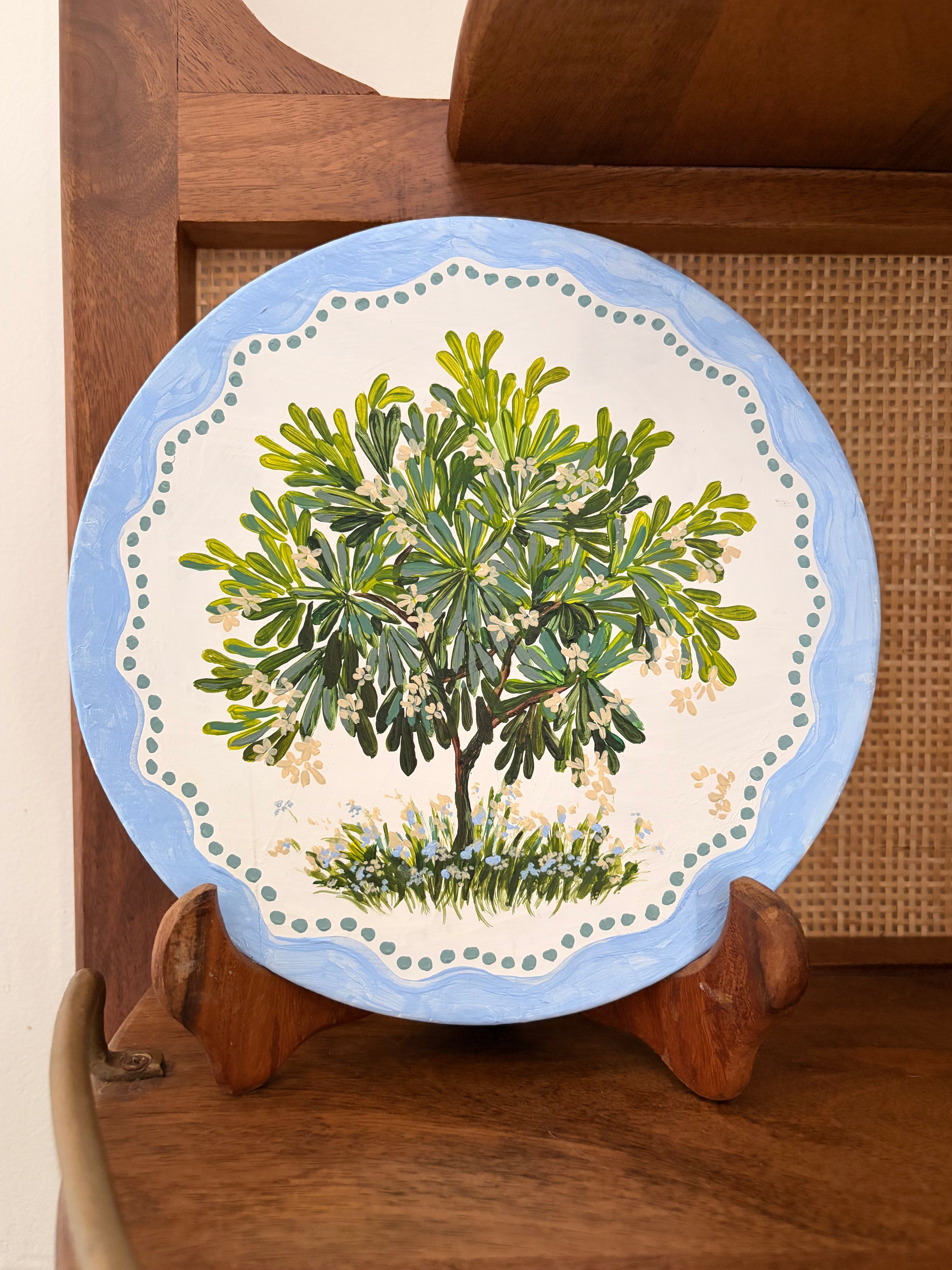 Firangipani on wood plate