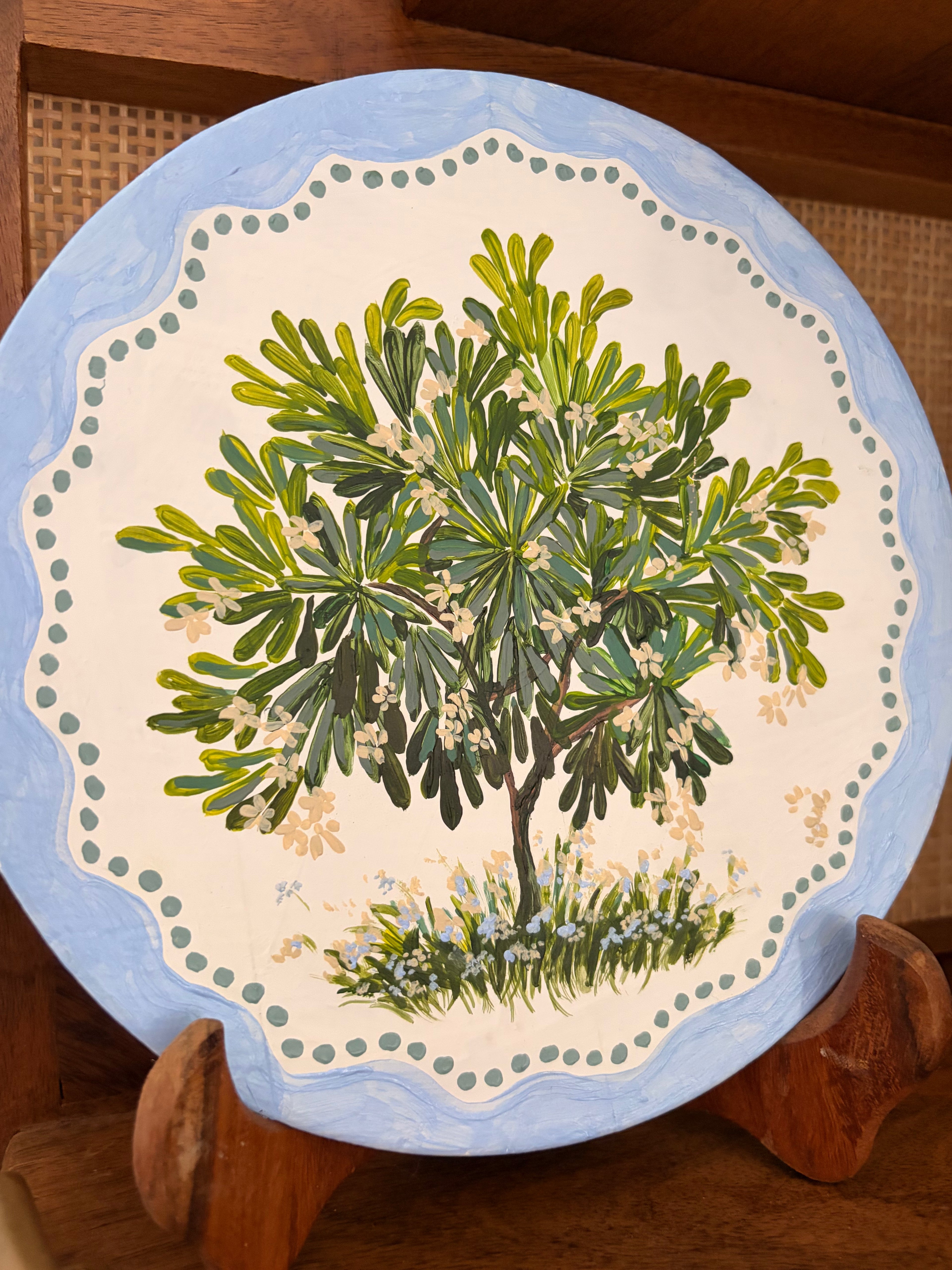 Firangipani on wood plate
