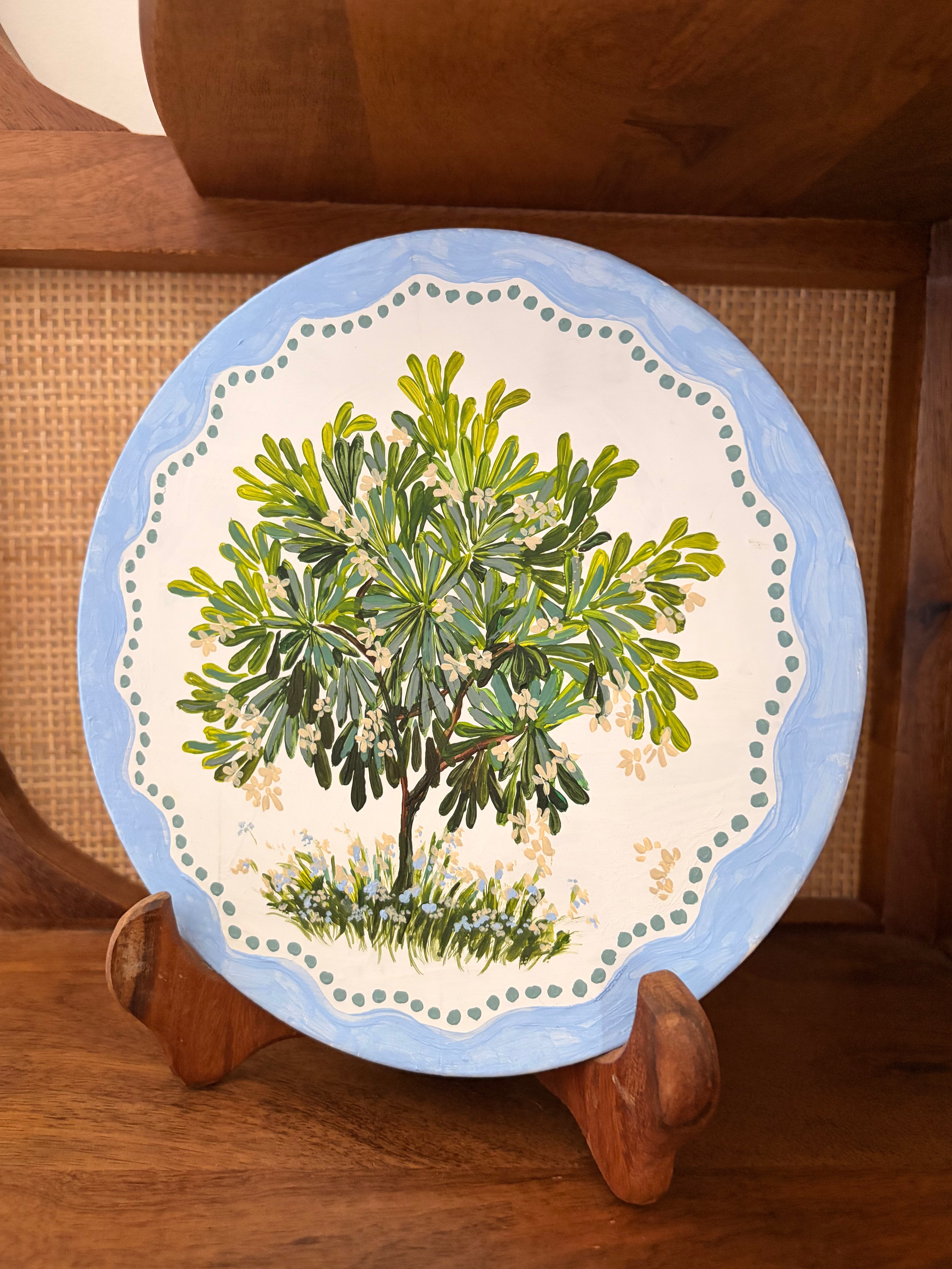 Firangipani on wood plate