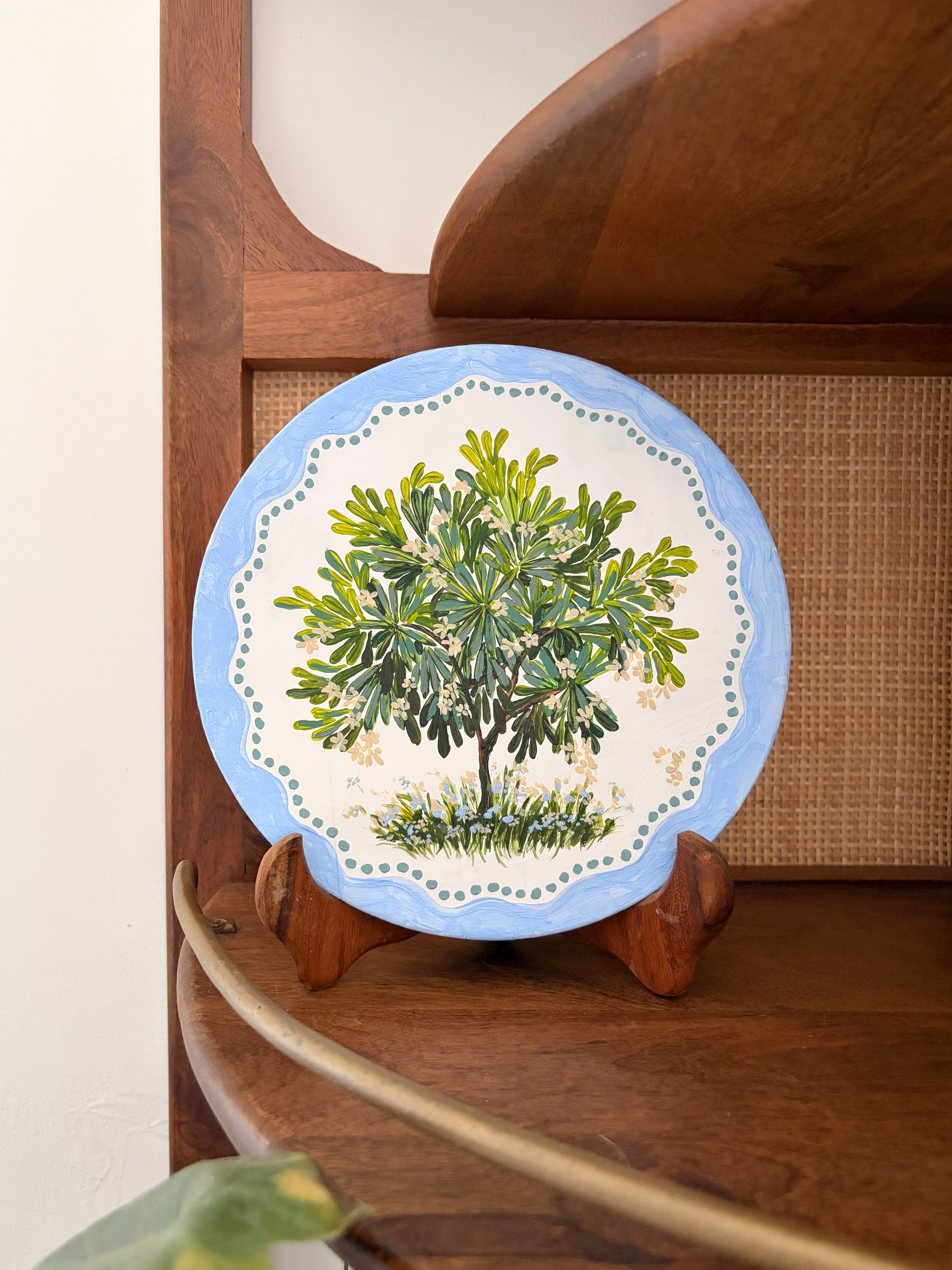 Firangipani on wood plate